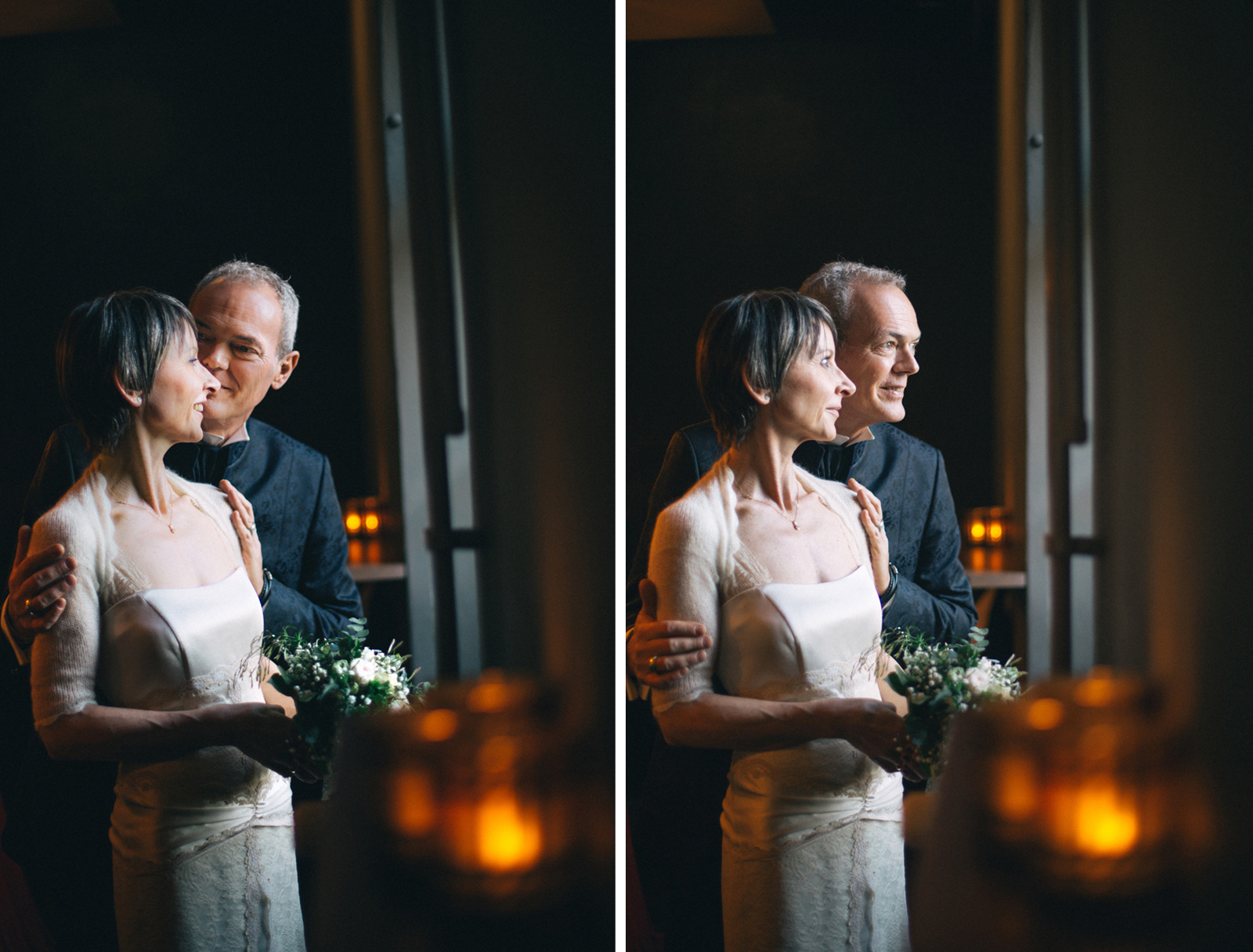 Bräutigam flüstert Braut etwas ins Ohr und beide sehen aus dem Fenster